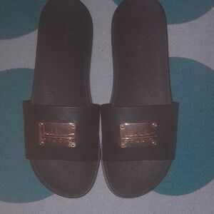 Nicole Miller Black Slide Sandals with Gold Accent